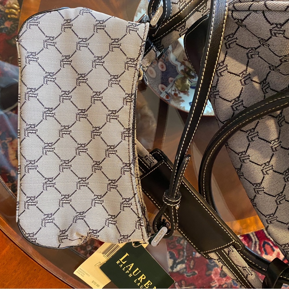Ralph Lauren small signature purse with black leather trim.
